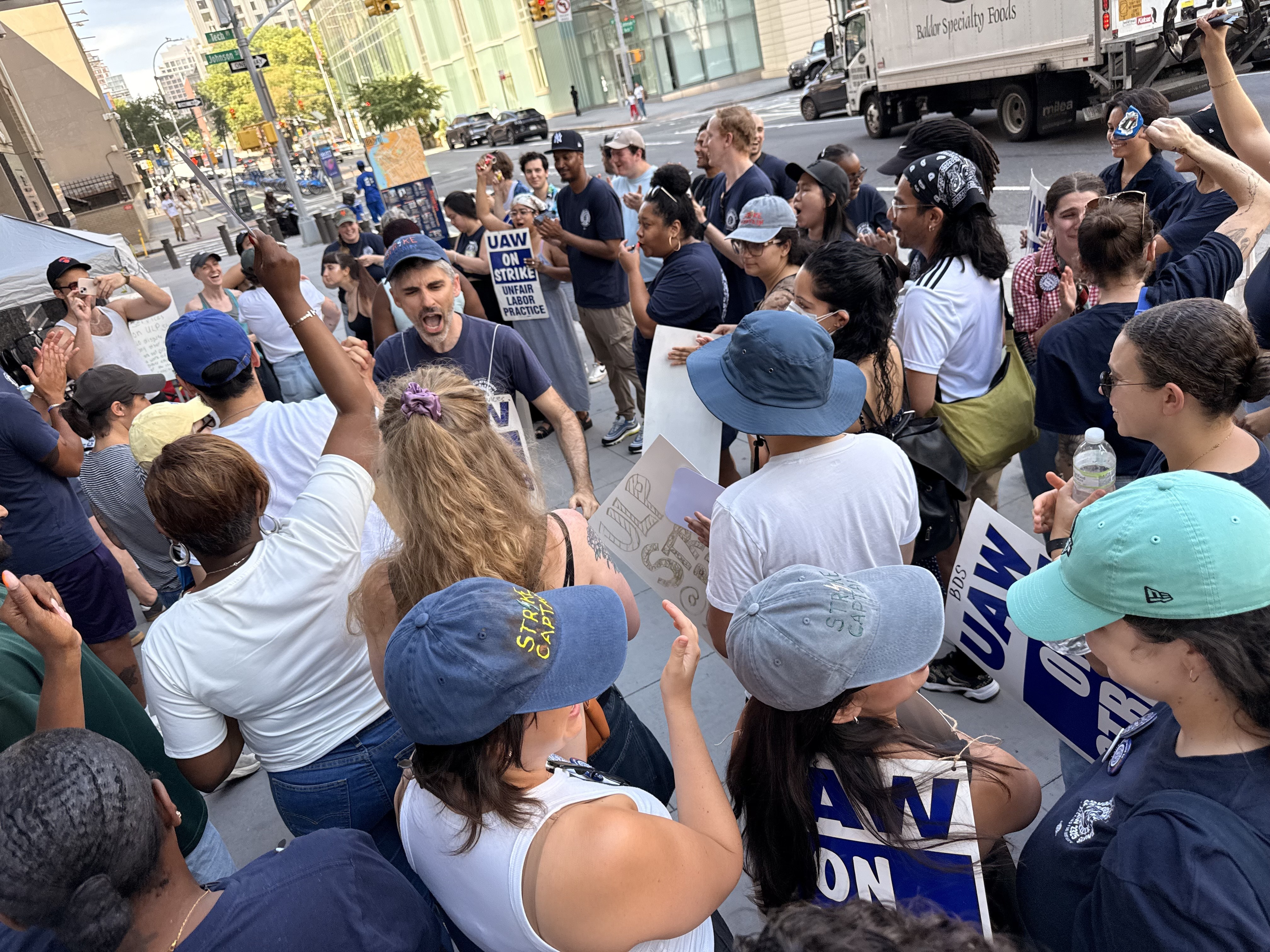 Union members picketing outside Brooklyn Defender Services offices.