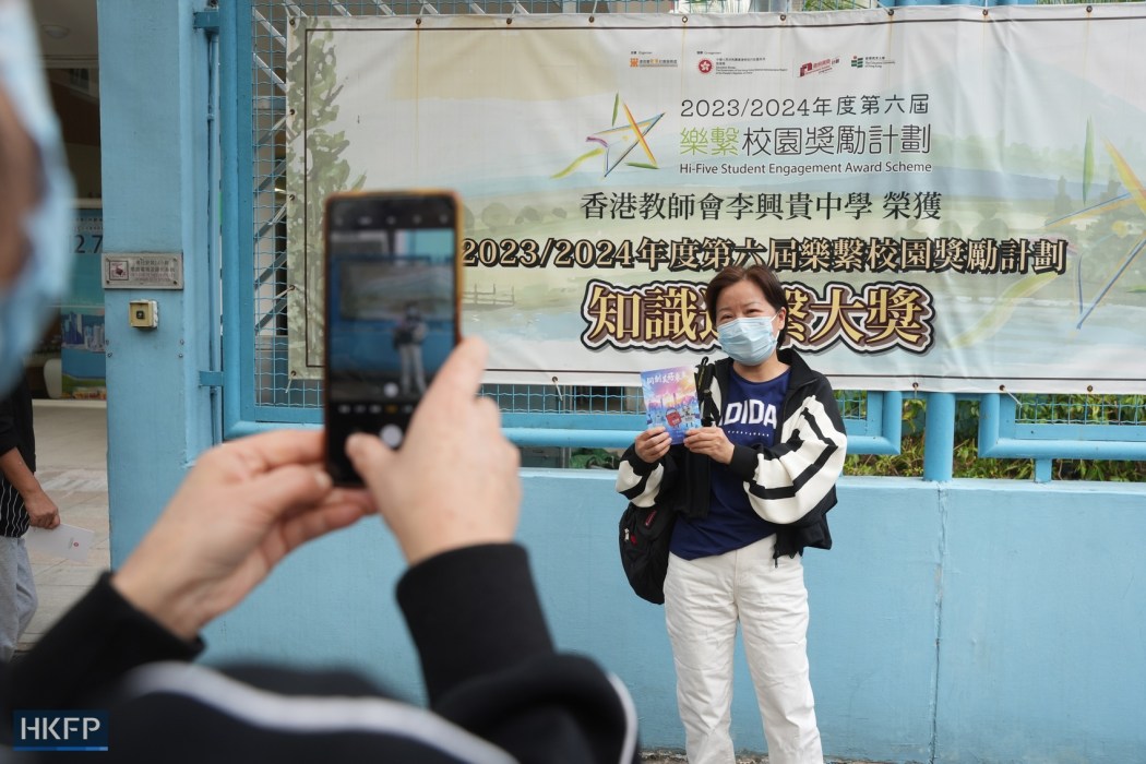 A voter at a Tai Po polling station for the 2025 LegCo elections, on December 7, 2025. Photo: Kyle Lam/HKFP.