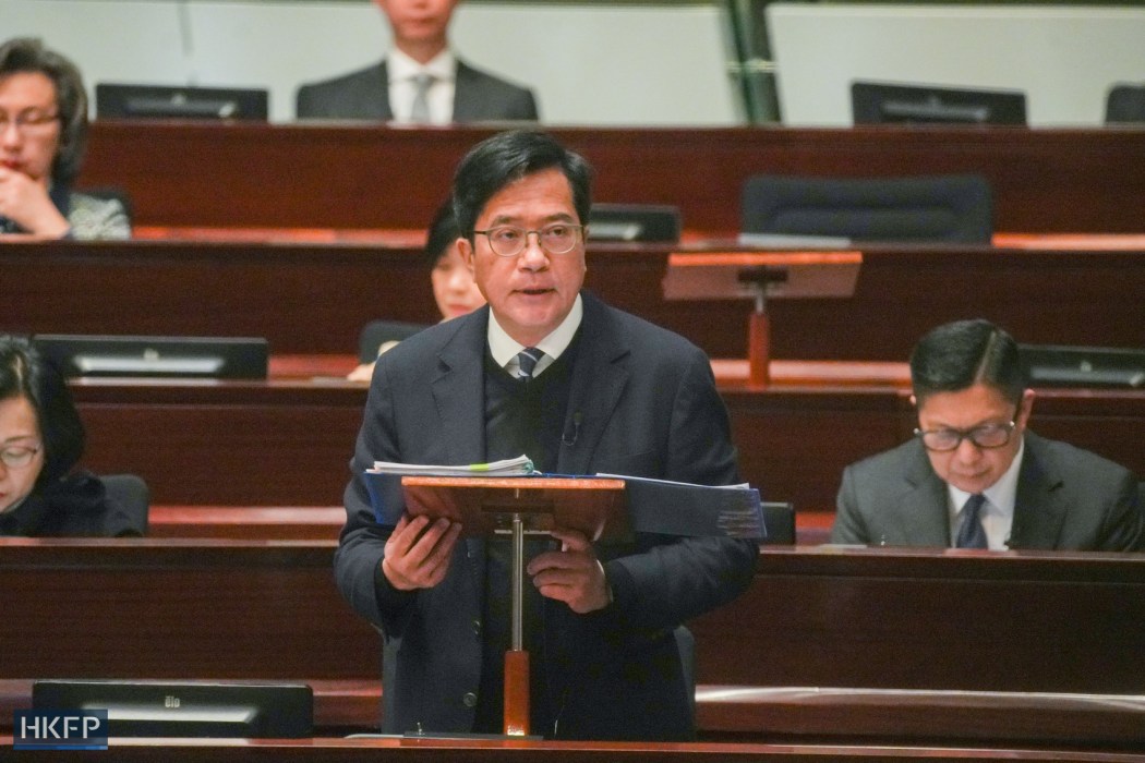 Hong Kong Deputy Financial Secretary Michael Wong addresses the Legislative Council on January 14, 2026. Photo: Kyle Lam/HKFP.