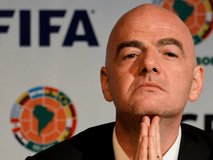 Gianni Infantino, FIFA president, with his chin resting on his fingertips while he holds his hands in prayer pose