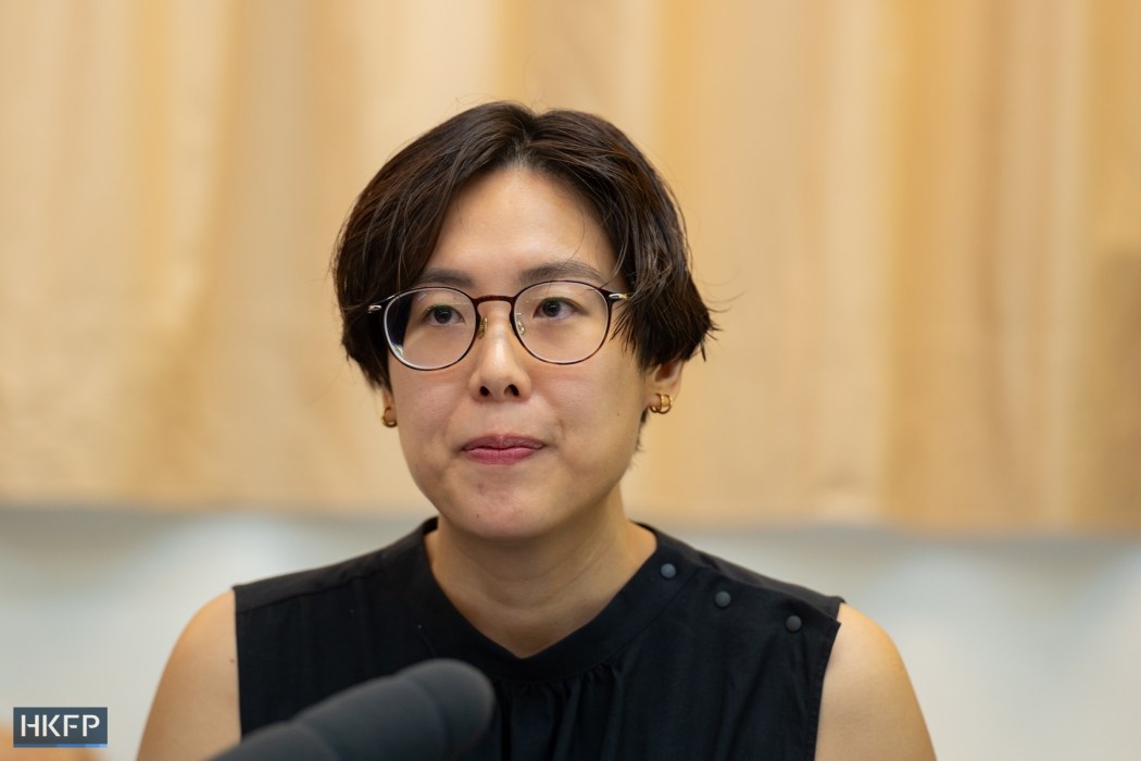 Janelle, a sexual assault victim and a member of We are X, talks to the press on July 8, 2026. Photo: Kyle Lam/HKFP.