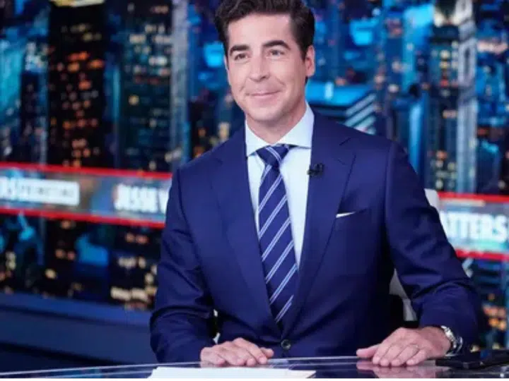 Jesse Watters dressed and ready for recording at the Fox News table