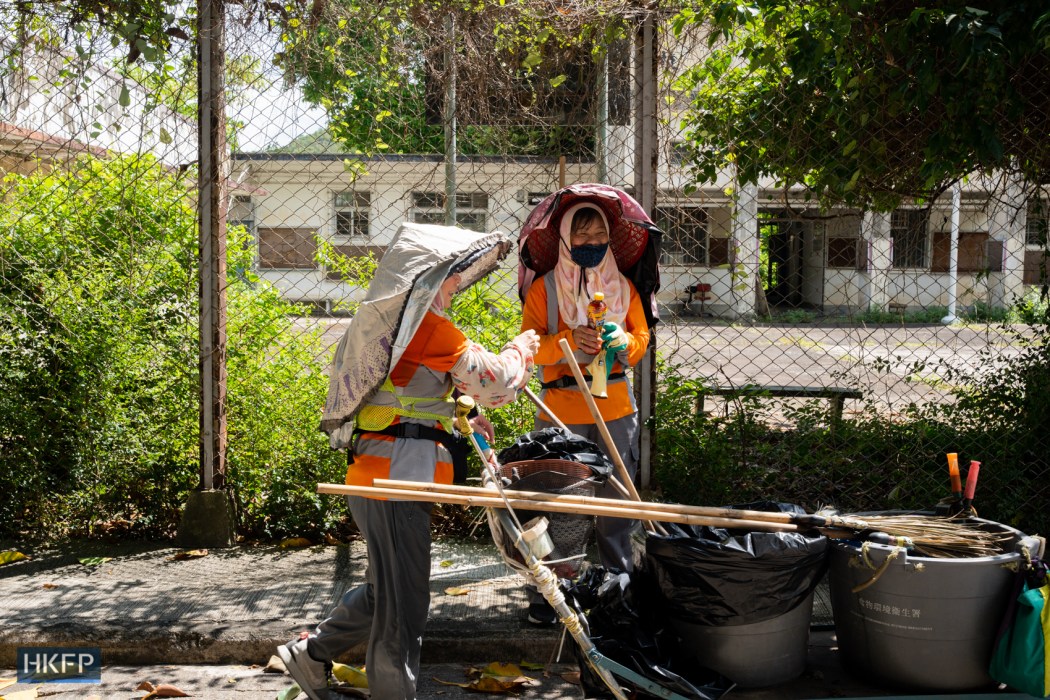 Cleaners sharing handmade lemon tea during works in the New Territories. Photo: Kyle Lam/HKFP.