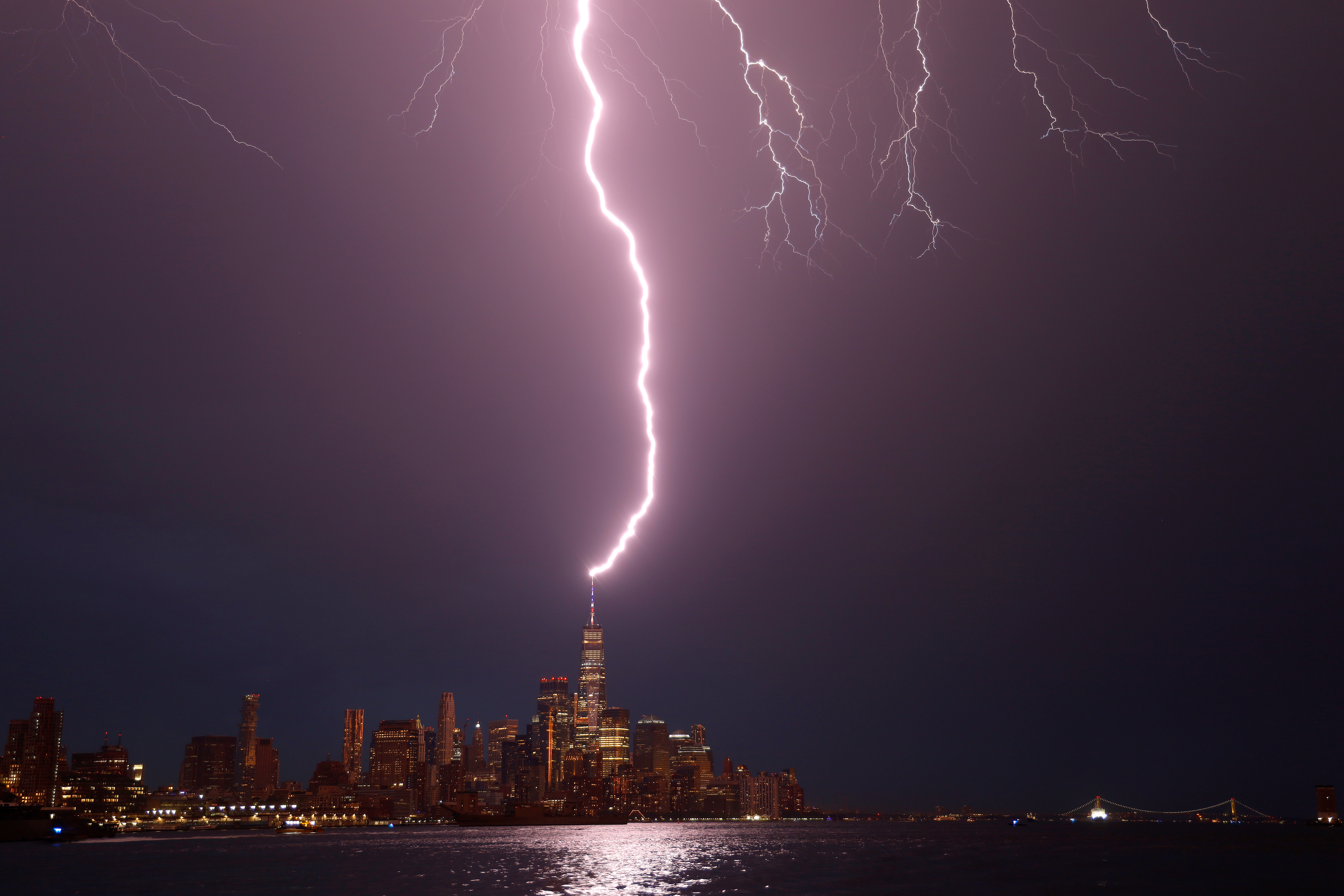 A photo of lightning striking the spire of One World Trade Friday night during a freak storm.