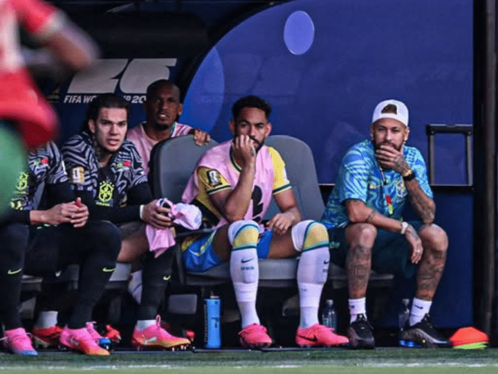 Neymar joins the Brazil team on the bench for their World Cup opener vs. Morocco