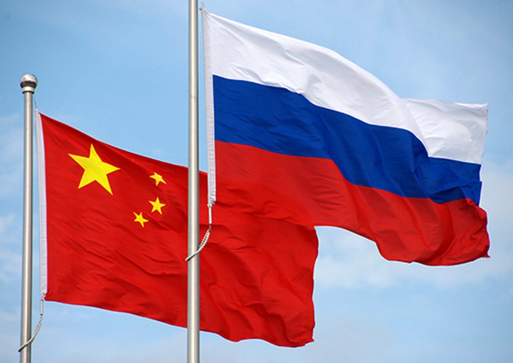 Chinese and Russian flags. File photo: Wikimedia Commons.