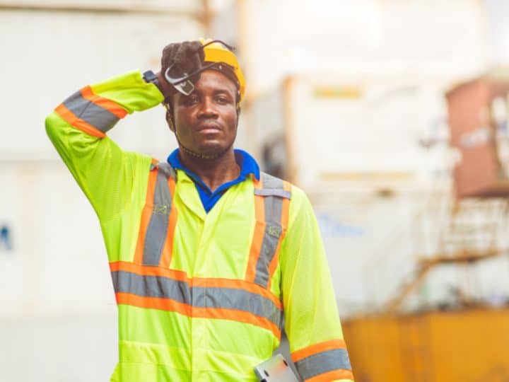 Tradespeople working in heat