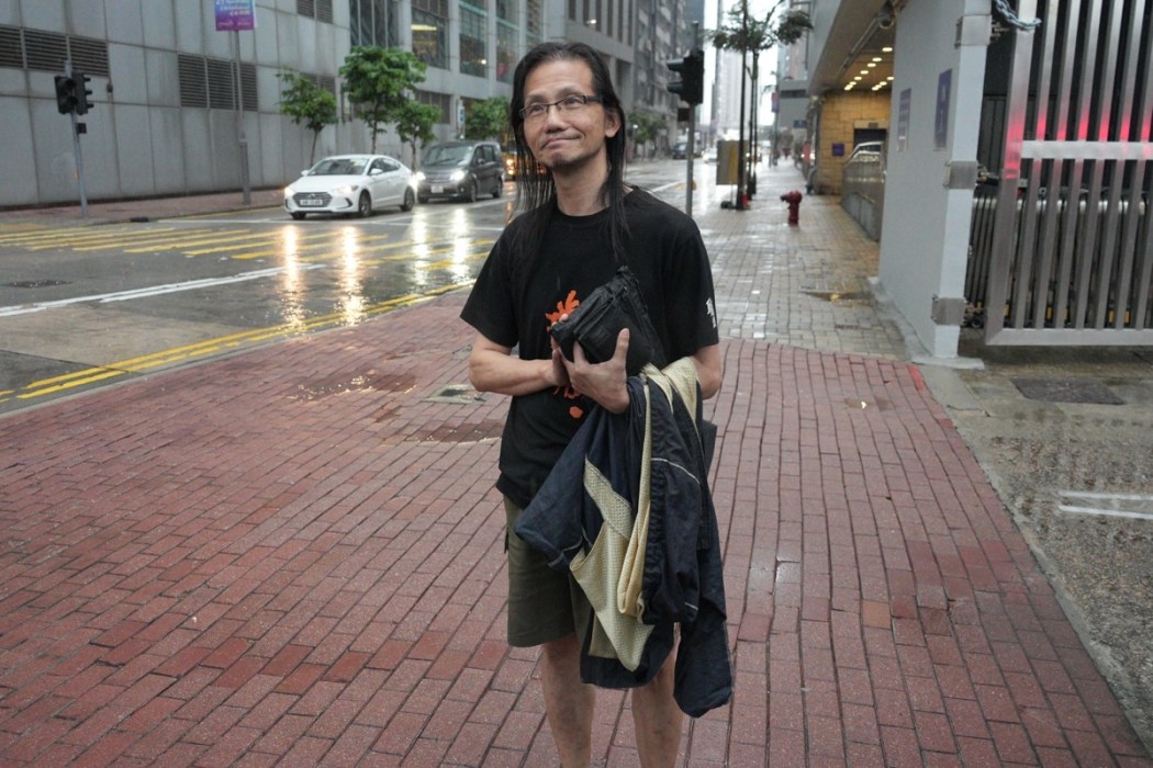 Co-founder of Have a Nice Stay bookstore Sum Wan-wah leaving North Point police station on July 17, 2026. Photo: Supplied.