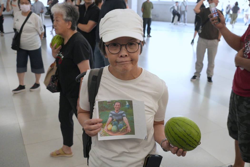 Activist Lee Ying-chi (left) at Yuen Long MTR station on July 21, 2026. Photo: Supplied.