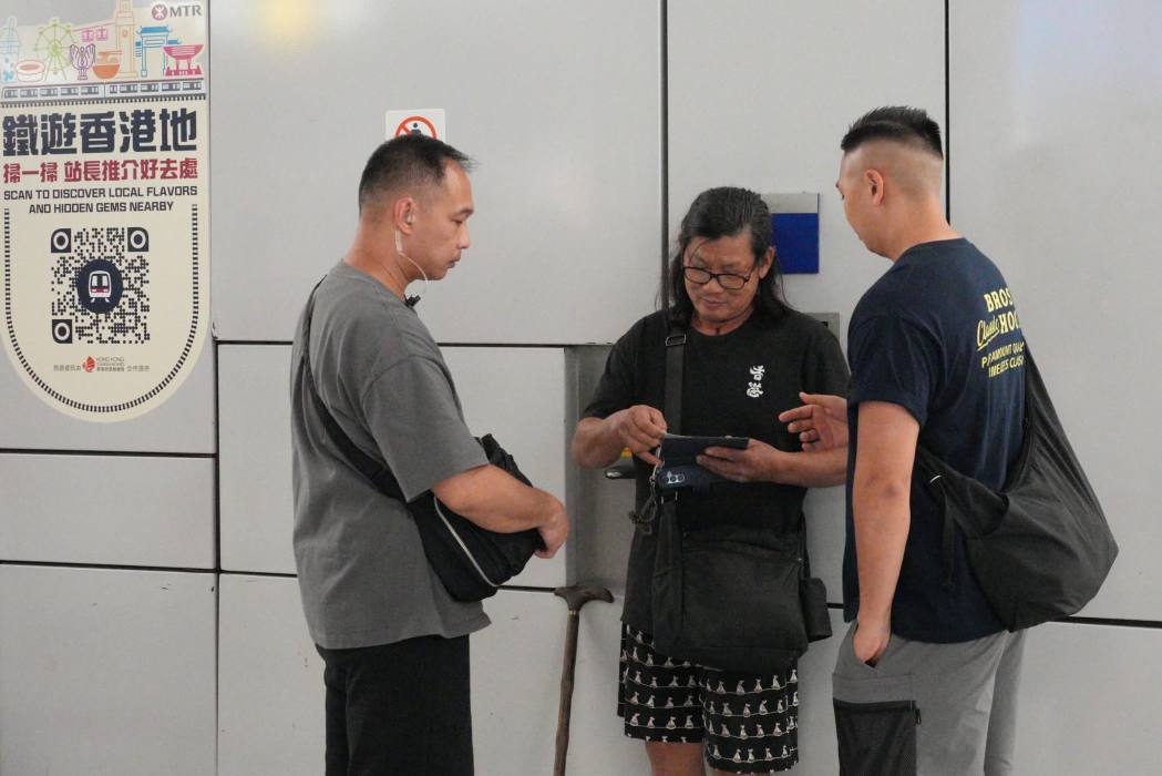 Plainclothes officers conduct a search at Yuen Long MTR station on July 21, 2026. Photo: Supplied.