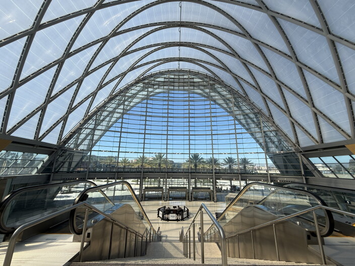 A large building with a glass domed roof.