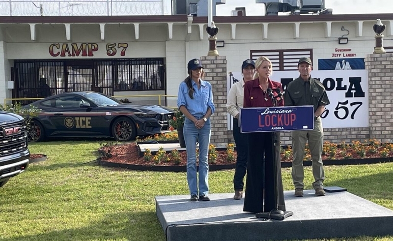 Fomer U.S. Attorney General Pam Bondi speaks last yearΒ at Louisiana State Penitentiary to announce the opening of Camp 57, a facility at the prison that will house immigrant detainees. An appeals court covering Louisiana and other states with large detention centers is at the center of a court fight over mandatory detention for many immigrants. (Photo by Piper Hutchinson/Louisiana Illuminator)