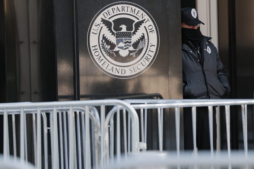 Security stands outside ICE headquarters while the Congressional Hispanic Caucus rallies on Feb. 3, 2026 in Washington, D.C. (Photo by Heather Diehl/Getty Images)