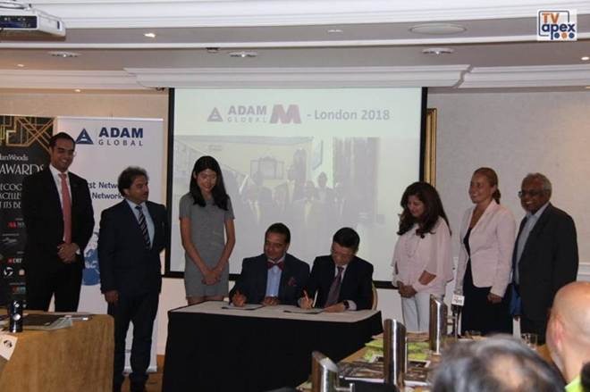 McMillan Woods Adam Global McMillan Woods and Adam Global representatives at the 2018 partnership-signing ceremony in London.