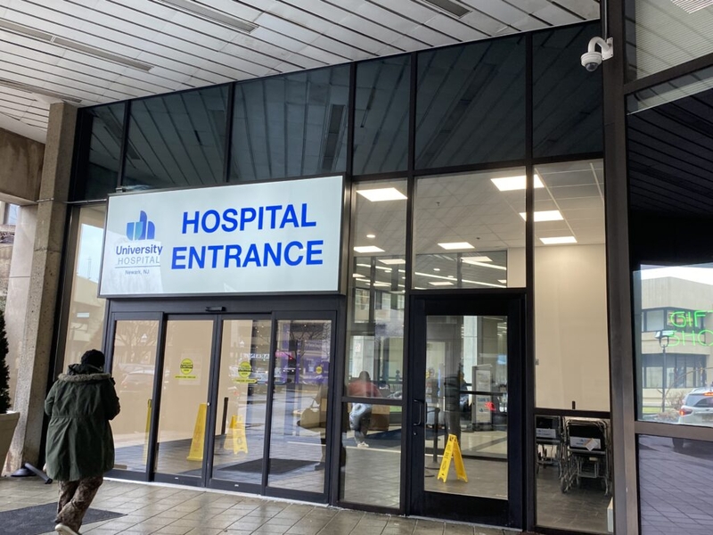A person walks into University Hospital in Newark, N.J. New Jersey has had one of the largest drops in deaths rates since 2015, according to a Stateline analysis. (Photo by Terrence McDonald/New Jersey Monitor)