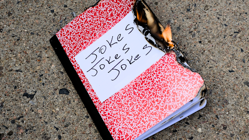 A book of jokes burning