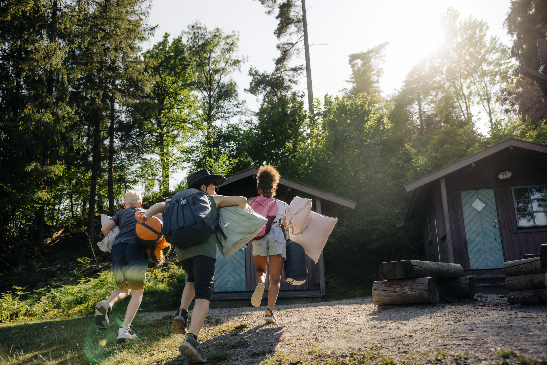 kids running to cabin