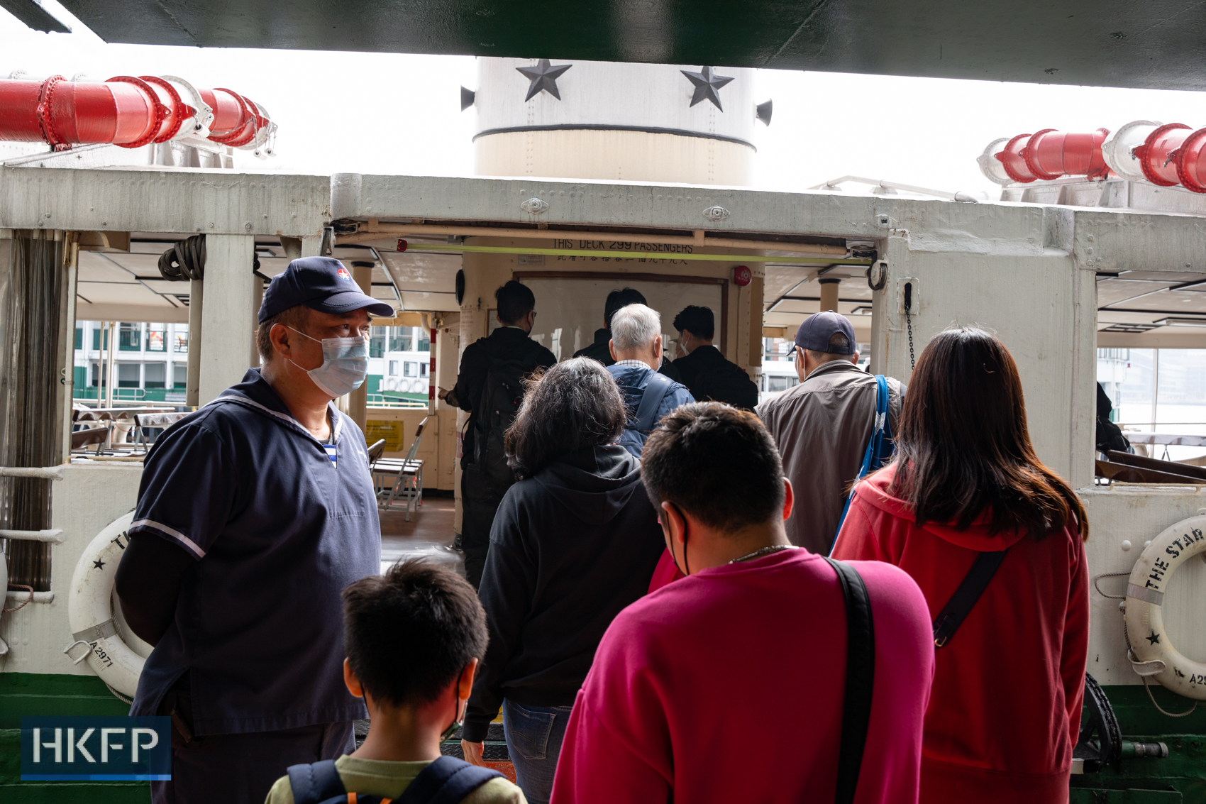 Passengers getting on a Star Ferry.