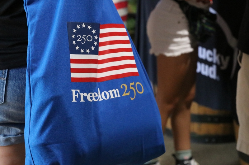 A branded bag is seen at Freedom 250’s Great American State Fair in Washington, D.C., on June 30, 2026. (Photo by Sam Gauntt/States Newsroom)