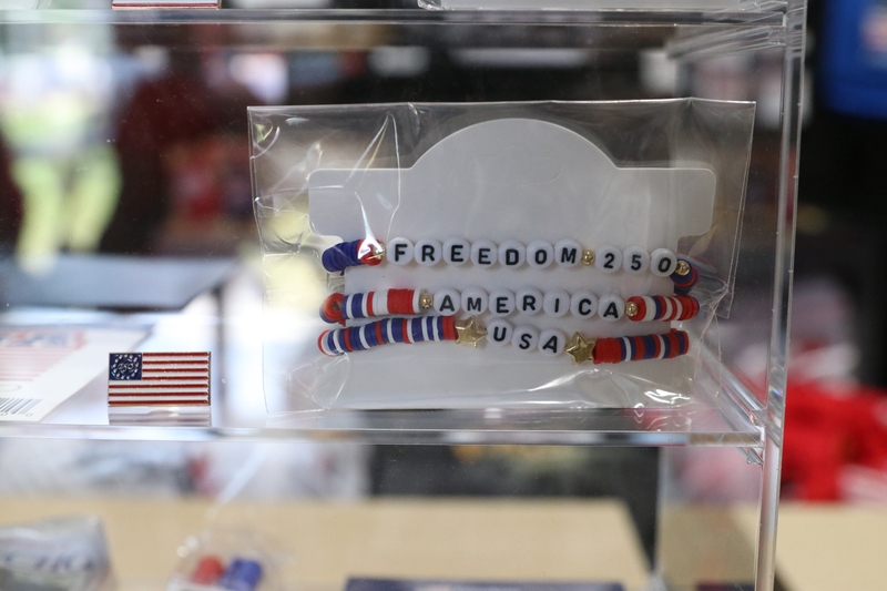 A bracelet tied to America’s 250th birthday is sold at Freedom 250’s Great American State Fair in Washington, D.C., on June 30, 2026. (Photo by Sam Gauntt/States Newsroom)