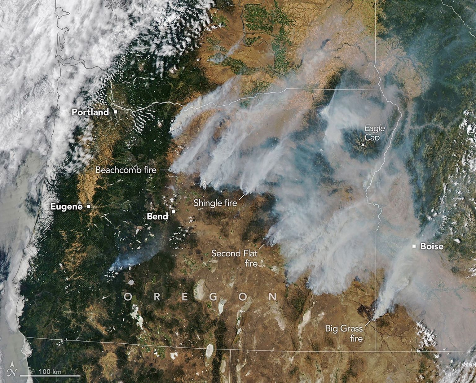 Smoke pours from dozens of large fires in Oregon in this image captured by a NASA satellite on July 26, 2026. (Photo courtesy of NASA Earth Observatory/Michala Garrison)