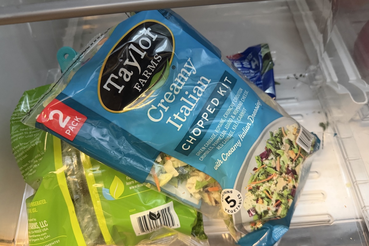 A bag of Taylor Farms salad in the fridge