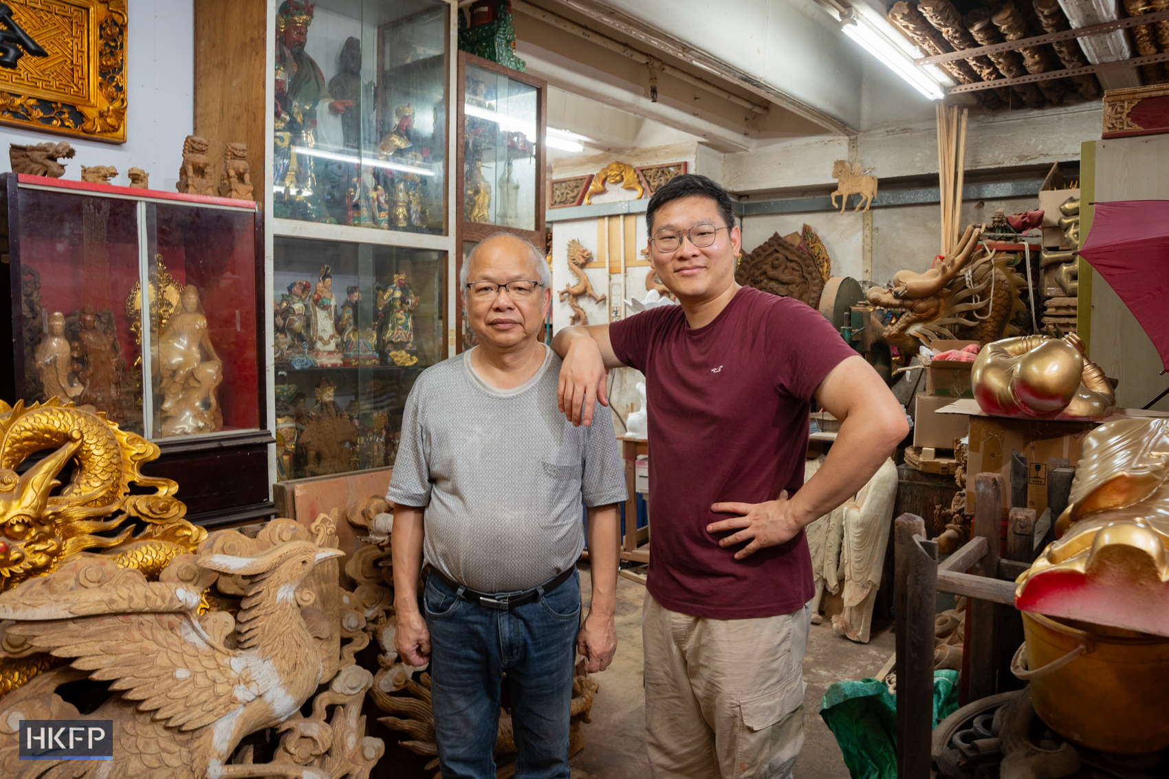Vitus Siu and Sylverster Siu pose for photos in an industrial building in Kwai Chung, July 27, 2026. Photo: Kyle Lam/HKFP.
