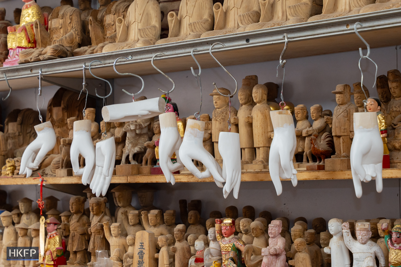 Wooden carvings in an industrial building in Kwai Chung, June 12th, 2026. Photo: Kyle Lam/HKFP.