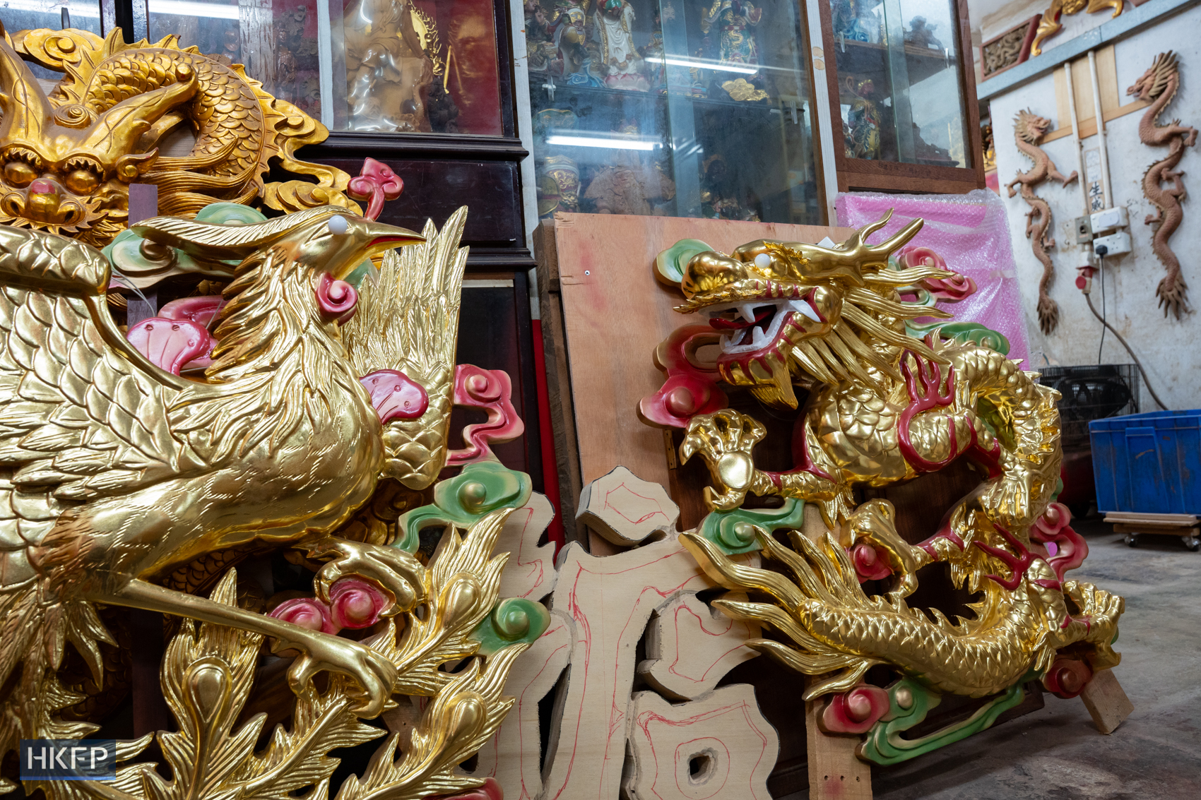 A pair of dragon and phoenix decoration displayed in an industrial building in Kwai Chung, April 8th, 2026. Photo: Kyle Lam/HKFP.