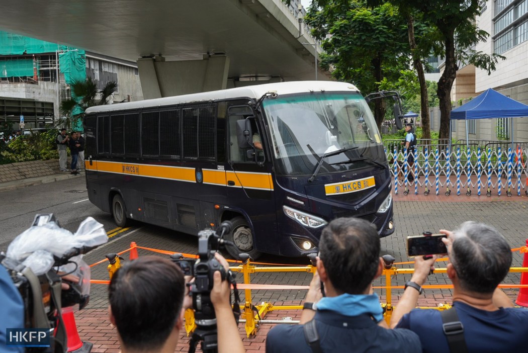 A correctional service vechile is seen entering the West Kowloon Law Courts Building on August 21, 2026, ahead of the verdict hearing of the trial of Tiananmen vigil activist Chow Hang-tung and Lee Cheuk-yan on national security charges. Photo: Kyle Lam/HKFP.