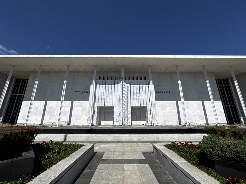 A weatherproof tarp covers the facade of the John F. Kennedy Center for the Performing Arts in Washington, D.C., on July 15, 2026. (Photo by Sam Gauntt/States Newsroom)